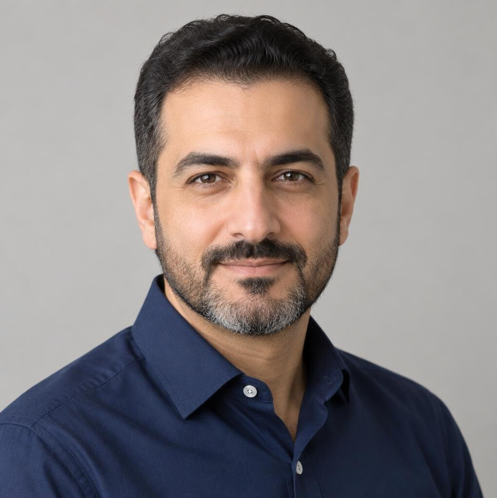 Portrait of a bearded man looking at the camera